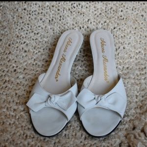 White kitten heel shoes